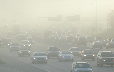 care in traffic covered by smog