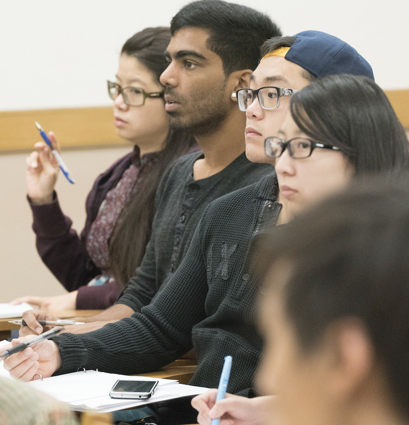 undergraduate students listening in class